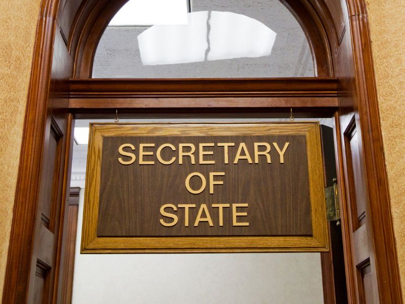 Secretary of State sign on a door - Fifteen Tips to Help Identify Unknown Sellers