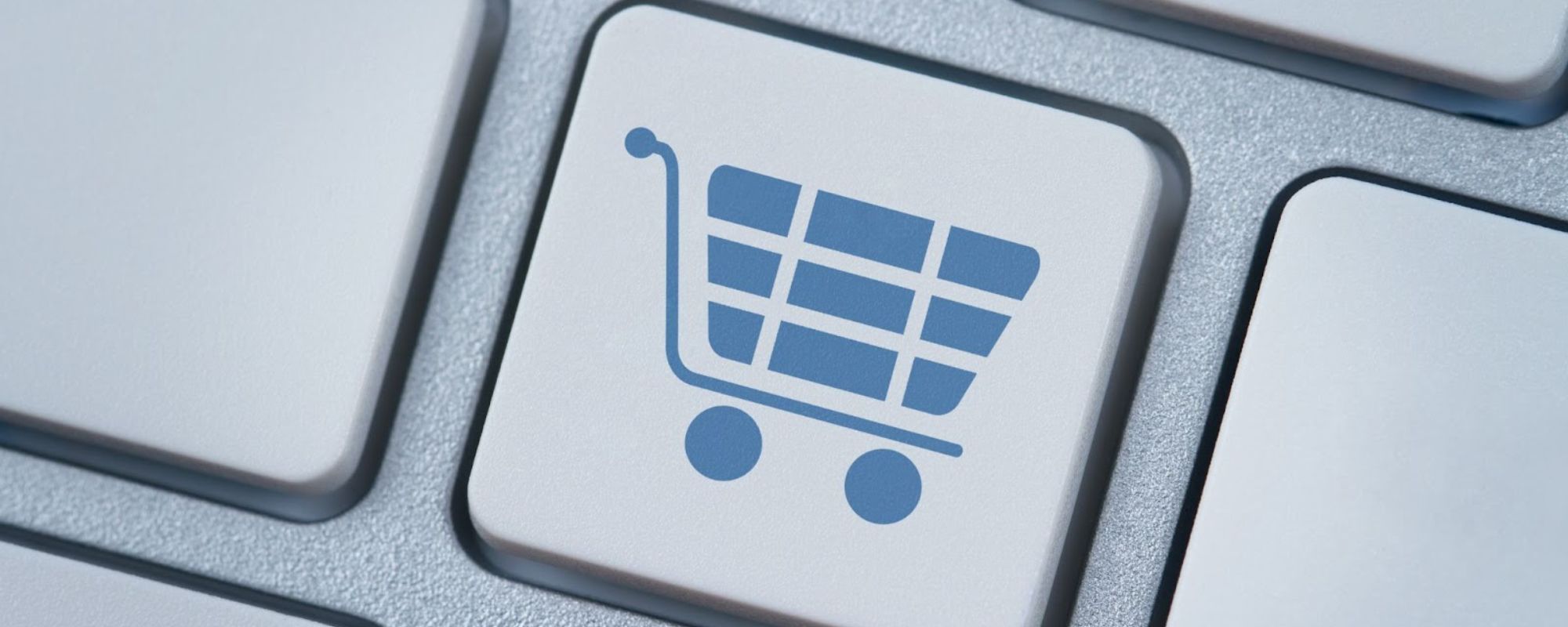 Keyboard key with a shopping cart image