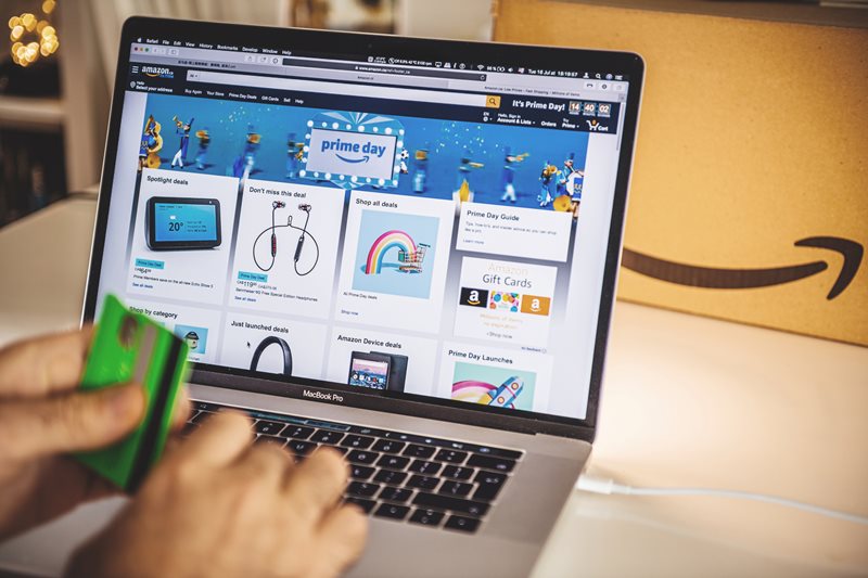 A laptop screen with Amazon Prime Day discounts